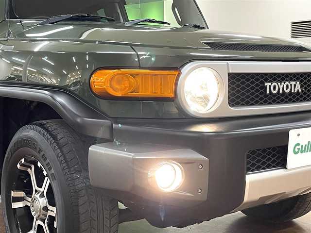 トヨタ ＦＪクルーザー 道央・札幌 2013(平25)年 7.6万km 緑Ⅱ 4WD/MKW製17インチAW/純正SDナビ/・フルセグTV/CD/DVD/SD/BT/バックカメラ/社外前後ドライブレコーダー/前後コーナーセンサー/横滑り防止装置/前後フォグライト/ETC/ヘッドライトレベライザー/純正フロアマット/純正ドアバイザー/ステアリングリモコン/背面タイヤ/カーテンエアバッグ/新車時保証書/取扱説明書