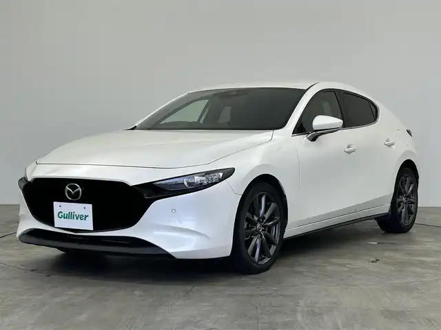 マツダ マツダ３ファストバック 15S ツーリング 群馬県 2020(令2)年 3.3万km スノーフレイクホワイトパールマイカ 純正１１．５インチナビ　３６０度カメラ　ＢＳＭ　レーダークルーズコントロール　純正１８インチＡＷ　ＨＵＤ　ステアリングリモコン　前後ドライブレコーダー　ＥＴＣ　プッシュスタート　スマートキー　禁煙車