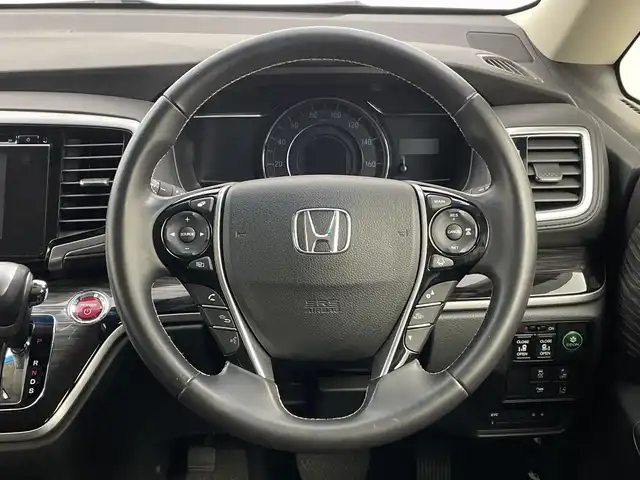 ホンダ オデッセイ ハイブリッド アブソルートセンシングアドバンP 新潟県 2017(平29)年 5.9万km プレミアムヴィーナスブラックP 純正メモリナビ/　フルセグTV/Bluetooth/CD/DVD/HDMI/ホンダセンシング/・衝突軽減ブレーキ(CMBS)/・車線維持支援システム(LKAS)/・アダプティブクルーズコントロール(ACC)/・後方誤発進抑制機能/・誤発進抑制機能/全方位モニター/両側パワースライドドア/ハーフレザーシート/運転席パワーシート/ETC/レザーステアリング/ステアリングスイッチ/LEDヘッドライト/純正17インチアルミホイール