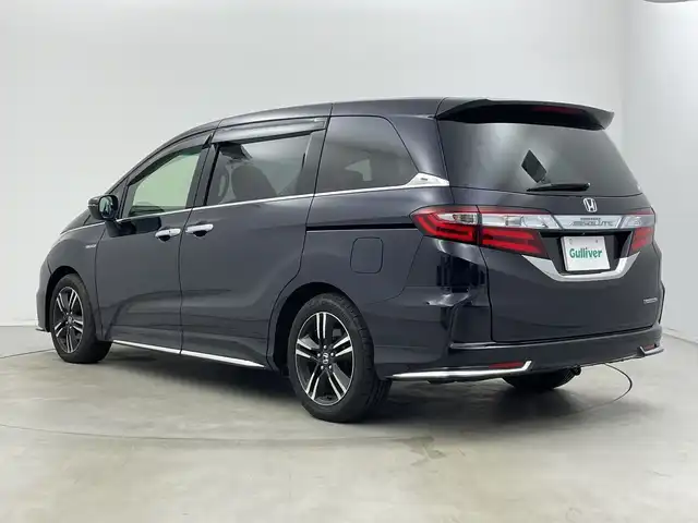 ホンダ オデッセイ ハイブリッド アブソルートセンシングアドバンP 新潟県 2017(平29)年 5.9万km プレミアムヴィーナスブラックP 純正メモリナビ/　フルセグTV/Bluetooth/CD/DVD/HDMI/ホンダセンシング/・衝突軽減ブレーキ(CMBS)/・車線維持支援システム(LKAS)/・アダプティブクルーズコントロール(ACC)/・後方誤発進抑制機能/・誤発進抑制機能/全方位モニター/両側パワースライドドア/ハーフレザーシート/運転席パワーシート/ETC/レザーステアリング/ステアリングスイッチ/LEDヘッドライト/純正17インチアルミホイール