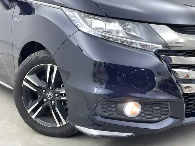 ホンダ オデッセイ ハイブリッド アブソルートセンシングアドバンP 新潟県 2017(平29)年 5.9万km プレミアムヴィーナスブラックP 純正メモリナビ/　フルセグTV/Bluetooth/CD/DVD/HDMI/ホンダセンシング/・衝突軽減ブレーキ(CMBS)/・車線維持支援システム(LKAS)/・アダプティブクルーズコントロール(ACC)/・後方誤発進抑制機能/・誤発進抑制機能/全方位モニター/両側パワースライドドア/ハーフレザーシート/運転席パワーシート/ETC/レザーステアリング/ステアリングスイッチ/LEDヘッドライト/純正17インチアルミホイール