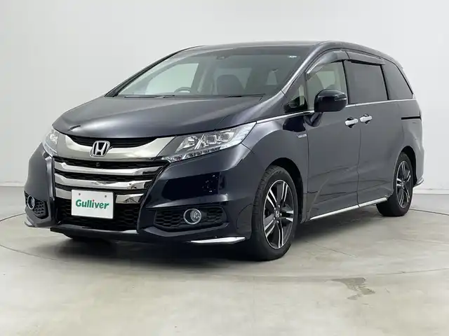 ホンダ オデッセイ ハイブリッド アブソルートセンシングアドバンP 新潟県 2017(平29)年 5.9万km プレミアムヴィーナスブラックP 純正メモリナビ/　フルセグTV/Bluetooth/CD/DVD/HDMI/ホンダセンシング/・衝突軽減ブレーキ(CMBS)/・車線維持支援システム(LKAS)/・アダプティブクルーズコントロール(ACC)/・後方誤発進抑制機能/・誤発進抑制機能/全方位モニター/両側パワースライドドア/ハーフレザーシート/運転席パワーシート/ETC/レザーステアリング/ステアリングスイッチ/LEDヘッドライト/純正17インチアルミホイール