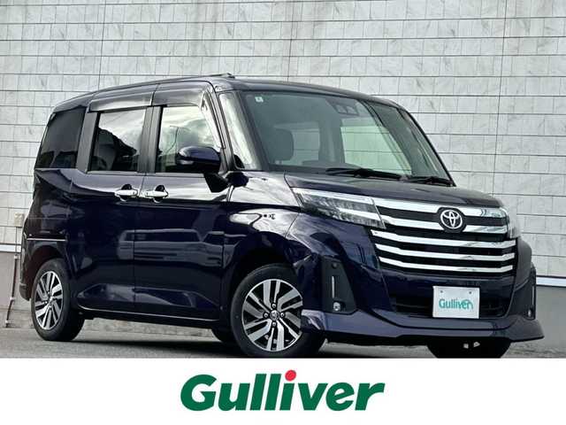 トヨタ ルーミー カスタムG 山形県 2022(令4)年 2万km クールバイオレットクリスタルシャイン 禁煙車/ワンオーナー/4WD/純正SDナビ/・フルセグTV/AM/FM/DVD/Bluetooth/レーダークルーズコントロール/アイドリングストップ/クリアランスソナー/衝突被害軽減ブレーキ/ふらつき警報/先行車発進お知らせ/車線逸脱警報/横滑り防止装置/両側パワースライドドア/LEDヘッドライト/オートライト/フロントフォグランプ/電動パーキングブレーキ/純正フロアマット/純正ドアバイザー/冬タイヤ積み込み/取扱説明書