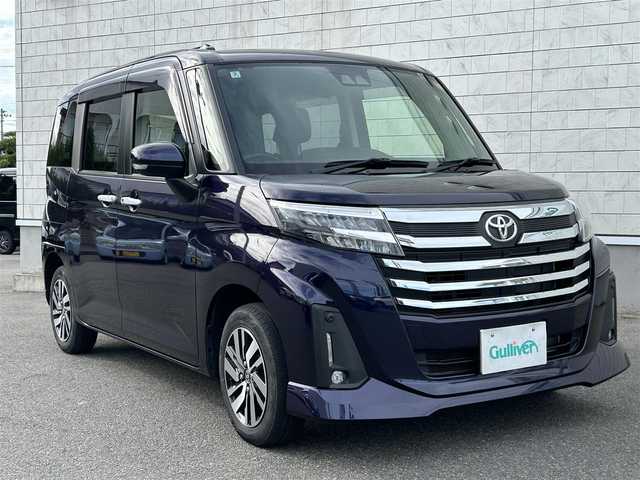 トヨタ ルーミー カスタムG 山形県 2022(令4)年 2万km クールバイオレットクリスタルシャイン 禁煙車/ワンオーナー/4WD/純正SDナビ/・フルセグTV/AM/FM/DVD/Bluetooth/レーダークルーズコントロール/アイドリングストップ/クリアランスソナー/衝突被害軽減ブレーキ/ふらつき警報/先行車発進お知らせ/車線逸脱警報/横滑り防止装置/両側パワースライドドア/LEDヘッドライト/オートライト/フロントフォグランプ/電動パーキングブレーキ/純正フロアマット/純正ドアバイザー/冬タイヤ積み込み/取扱説明書