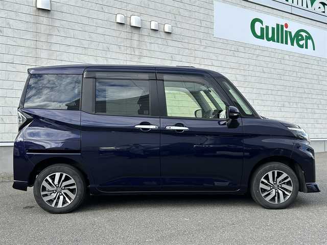 トヨタ ルーミー カスタムG 山形県 2022(令4)年 2万km クールバイオレットクリスタルシャイン 禁煙車/ワンオーナー/4WD/純正SDナビ/・フルセグTV/AM/FM/DVD/Bluetooth/レーダークルーズコントロール/アイドリングストップ/クリアランスソナー/衝突被害軽減ブレーキ/ふらつき警報/先行車発進お知らせ/車線逸脱警報/横滑り防止装置/両側パワースライドドア/LEDヘッドライト/オートライト/フロントフォグランプ/電動パーキングブレーキ/純正フロアマット/純正ドアバイザー/冬タイヤ積み込み/取扱説明書