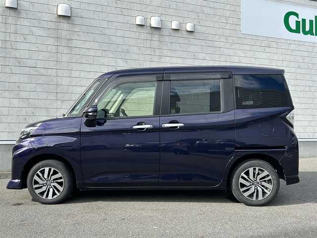 トヨタ ルーミー カスタムG 山形県 2022(令4)年 2万km クールバイオレットクリスタルシャイン 禁煙車/ワンオーナー/4WD/純正SDナビ/・フルセグTV/AM/FM/DVD/Bluetooth/レーダークルーズコントロール/アイドリングストップ/クリアランスソナー/衝突被害軽減ブレーキ/ふらつき警報/先行車発進お知らせ/車線逸脱警報/横滑り防止装置/両側パワースライドドア/LEDヘッドライト/オートライト/フロントフォグランプ/電動パーキングブレーキ/純正フロアマット/純正ドアバイザー/冬タイヤ積み込み/取扱説明書
