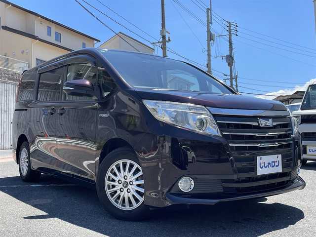 トヨタ ノア ハイブリッド G 福岡県 2015(平27)年 11.9万km ボルドーマイカメタリック (株)IDOMが運営する【じしゃロン八幡西店】の自社ローン専用車両になります。こちらは現金またはオートローンご利用時の価格です。自社ローンご希望の方は別途その旨お申付け下さい/・純正ナビ（NSZT-Y64T）/・Bluetooth/・バックカメラ/・片側パワースライド/・ドライブレコーダー/・ETC/・前席シートヒーター/・プッシュスタート/・スマートキー/・純正フロアマット