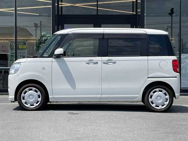 ダイハツ ムーヴ キャンバス X 茨城県 2016(平28)年 2.5万km パールホワイトⅢ 純正ナビ/【TV・CD・DVD・iPod・SD・BT・AM・FM・USB・HDMI】/Bカメラ/両側スライドドア/ステリモ/アイドリングストップ/オートライト/ヘッドライトレベライザー/ハロゲンライト/横滑り防止装置/純正フロアマット/純正ホイールカバー/電格ミラー/ドアバイザー