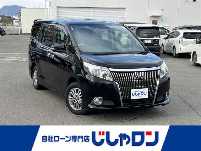 トヨタ エスクァイア Gi 福島県 2014(平26)年 14.8万km ブラック (株)IDOMが運営する【じしゃロン福島店】の自社ローン専用車両になります。こちらは現金またはオートローンご利用時の価格です。自社ローンご希望の方は別途その旨お申付け下さい/純正ナビ/フルセグテレビ/ツインムーンルーフ/両側パワースライドドア/バックカメラ/シートヒーター/純正AWアルミホイール/ETC/積み込み冬タイヤ付き/オートマチックハイビーム/クルーズコントロール