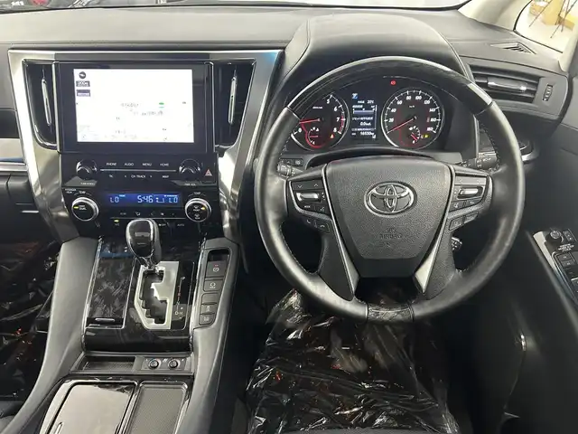 トヨタ アルファード S Cパッケージ 埼玉県 2021(令3)年 1.7万km ホワイトパールクリスタルシャイン サンルーフ　１２型フリップダウン　両側電動スライド　純正ディスプレイオーディオ　ナビ機能　ＣＤ　ＤＶＤ　Ｂｌｕｅｔｏｏｔｈ　前席シートヒーター　前席シートベンチレーション　電動オットマン　パワーシート ハンドルヒーター