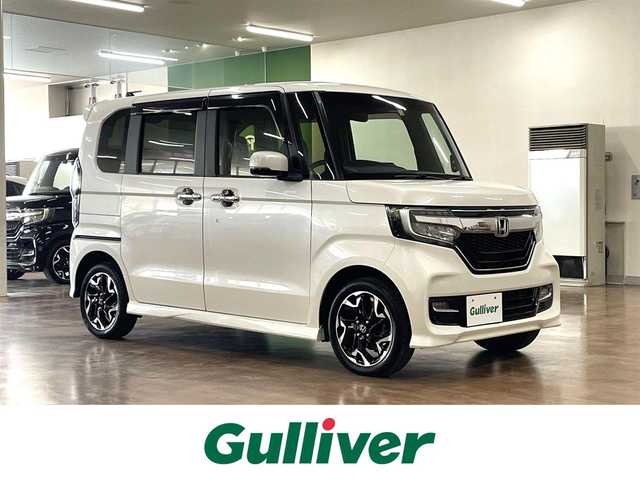 ホンダ Ｎ ＢＯＸ カスタム G L ターボ ホンダセンシング 道央・札幌 2018(平30)年 3.6万km プレミアムホワイトパールⅡ 4WD/ターボ/純正8インチSDナビ/フルセグTV/Bluetooth/CD/DVD/SD/バックカメラ/衝突軽減ブレーキ/レーンキープ/横滑り防止/両側パワースライドドア/ハーフレザーシート/シートヒーター（D/N）/ミラーヒーター/レーダークルーズコントロール/パドルシフト/オートライト/USBソケット/ビルトインETC/LEDヘッドライト/フォグランプ/プッシュスタート/スマートキー×2/純正エンジンスターター/純正15インチAW/後席サンシェード/取扱説明書