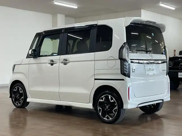 ホンダ Ｎ ＢＯＸ カスタム G L ターボ ホンダセンシング 道央・札幌 2018(平30)年 3.6万km プレミアムホワイトパールⅡ 4WD/ターボ/純正8インチSDナビ/フルセグTV/Bluetooth/CD/DVD/SD/バックカメラ/衝突軽減ブレーキ/レーンキープ/横滑り防止/両側パワースライドドア/ハーフレザーシート/シートヒーター（D/N）/ミラーヒーター/レーダークルーズコントロール/パドルシフト/オートライト/USBソケット/ビルトインETC/LEDヘッドライト/フォグランプ/プッシュスタート/スマートキー×2/純正エンジンスターター/純正15インチAW/後席サンシェード/取扱説明書