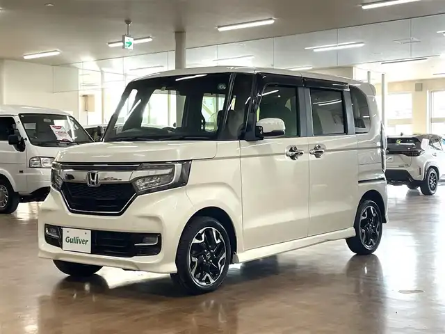 ホンダ Ｎ ＢＯＸ カスタム G L ターボ ホンダセンシング 道央・札幌 2018(平30)年 3.6万km プレミアムホワイトパールⅡ 4WD/ターボ/純正8インチSDナビ/フルセグTV/Bluetooth/CD/DVD/SD/バックカメラ/衝突軽減ブレーキ/レーンキープ/横滑り防止/両側パワースライドドア/ハーフレザーシート/シートヒーター（D/N）/ミラーヒーター/レーダークルーズコントロール/パドルシフト/オートライト/USBソケット/ビルトインETC/LEDヘッドライト/フォグランプ/プッシュスタート/スマートキー×2/純正エンジンスターター/純正15インチAW/後席サンシェード/取扱説明書