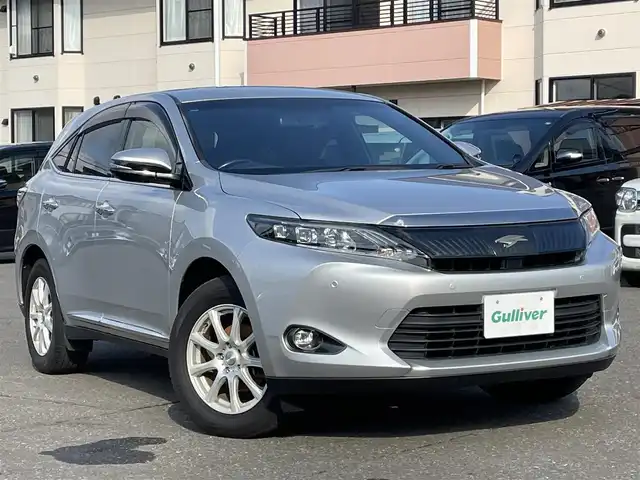 トヨタ ハリアー エレガンス 道央・札幌 2016(平28)年 7.6万km シルバーM 　ワンオーナー　/　4　W　D　/寒冷地仕様/純正SDナビ(CD/DVD/FM/AM/SD/BT)/フルセグ（走行中視聴可能）/バックカメラ/アイドリングストップ/ウィンカーミラー/クルーズコントロール（追従走行あり）/ドアバイザー/プッシュスタート/ビルトインETC/MTモード付AT/パーキングアシスト/スペアキー×１/純正フロアマット/パワーシート（運転席）/横滑り防止装置/コーナーセンサー/盗難防止装置/オートライト/カーテンエアバッグ/純正エンジンスターター/フォグランプ/リアフォグランプ/ステアリングスイッチ/革巻きステアリング/ワイパー間欠時間コントローラー/フロントデアイサースイッチ/電動格納ミラー/ECO　MODE/PWR　MODE/積込冬タイヤ（純正AW/225/65/R17/24年製/溝7ｍｍ）