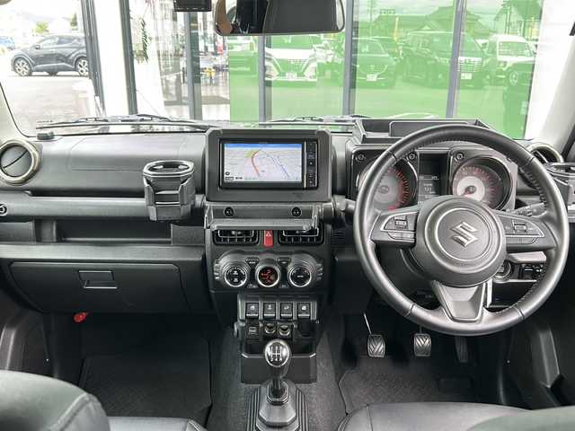 スズキ ジムニー XC 岐阜県 2021(令3)年 5.6万km ブルーイッシュブラックパール3 登録時走行距離55754km/社外ナビ/フルセグＴＶ/ルーフラック/４ＷＤ/前後ドライブレコーダー/レーンキープアシスト/シートヒーター/純正アルミホイール/純正フロアマット/ヘッドライトウォッシャー/ＬＥＤヘッドライト/オートライト/フォグランプ/禁煙車/ドアバイザー/ルーフラック/トランスファースイッチ/Bluetooth接続/USB入力端子/プッシュスタート/スマートキー/衝突被害軽減システム