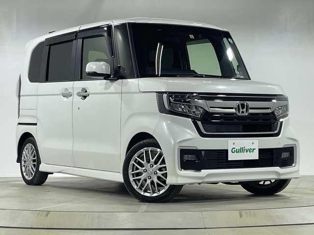 ホンダ Ｎ ＢＯＸ カスタム L ターボ 神奈川県 2022(令4)年 1.5万km プラチナホワイトパール 純正8型SDナビゲーション【VXU-227NBi】/AM FM フルセグ Bluetooth AppleCarPlay /バックカメラ/両側パワースライドドア/ホンダセンシング/アダプティブクルーズコントロール/シートヒーター/ETC/ドライブレコーダー/純正フロアマット/ステアリングスイッチ/スマートキー/スペアキー/LEDヘッドライト/オートライト/純正15インチアルミホイル/ドアバイザー/レーントレーシングアラート/クリアランスソナー