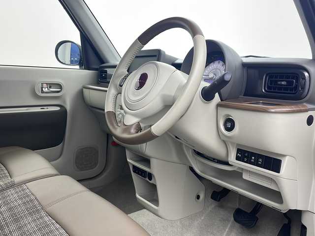 スズキ ラパン ＬＣ X 栃木県 2022(令4)年 0.7万km ソフトベージュメタリック スズキセーフティサポート/・デュアルカメラブレーキサポート/・誤発進抑制機能/・車線逸脱抑制機能/・車線逸脱警報機能/・ふらつき警報機能/・先行車発進お知らせ機能/・標識認識機能/・ハイビームアシスト/純正14インチAW/ハーフレザーシート/シートヒーター/USBソケット/オートライト/LEDライト/プッシュスタート/スマートキー