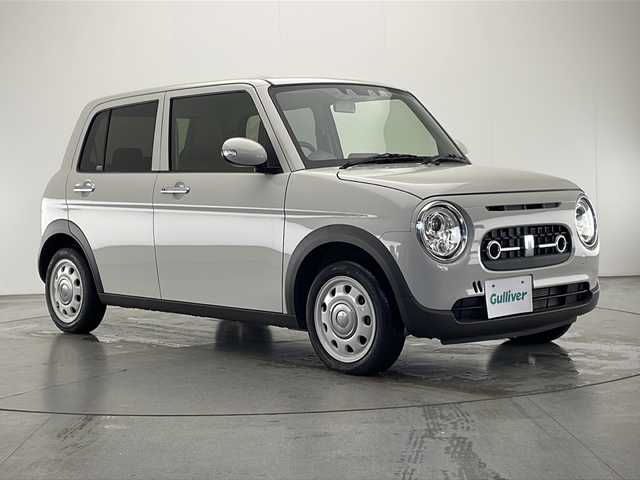 スズキ ラパン ＬＣ X 宮崎県 2022(令4)年 0.7万km ソフトベージュメタリック スズキセーフティサポート/・デュアルカメラブレーキサポート/・誤発進抑制機能/・車線逸脱抑制機能/・車線逸脱警報機能/・ふらつき警報機能/・先行車発進お知らせ機能/・標識認識機能/・ハイビームアシスト/純正14インチAW/ハーフレザーシート/シートヒーター/USBソケット/オートライト/LEDライト/プッシュスタート/スマートキー