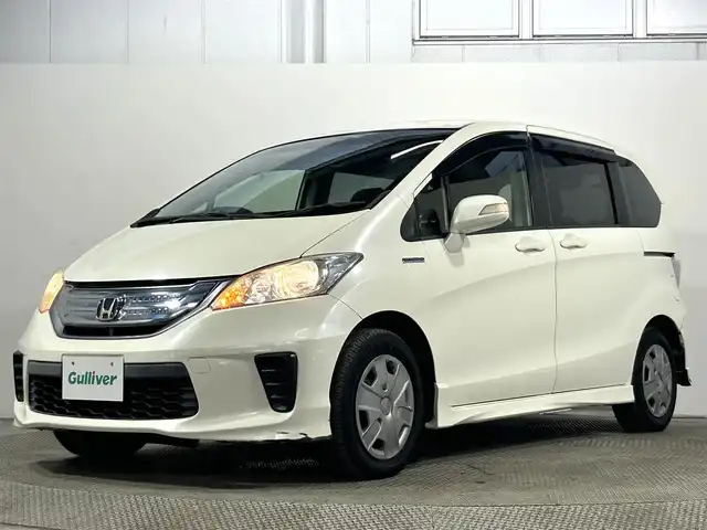 ホンダ フリード ハイブリット 大阪府 2012(平24)年 6.4万km プレミアムホワイトパール 純正ナビ(FM/AM/CD再生) バックカメラ ETC 片側パワースライドドア オートエアコン 横滑り防止 ヘッドライトレベライザー リモコンキー USB