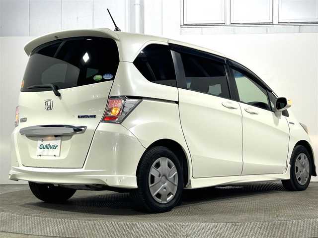 ホンダ フリード ハイブリット 大阪府 2012(平24)年 6.4万km プレミアムホワイトパール 純正ナビ(FM/AM/CD再生) バックカメラ ETC 片側パワースライドドア オートエアコン 横滑り防止 ヘッドライトレベライザー リモコンキー USB