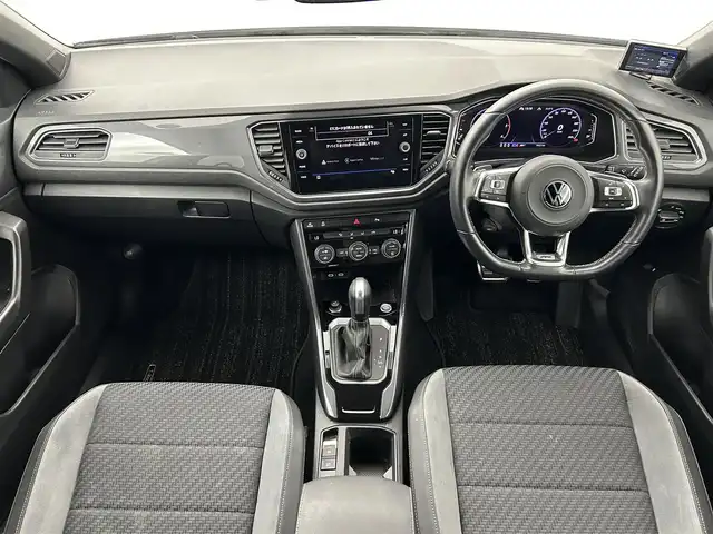 フォルクスワーゲン ＶＷ Ｔ－ロック TDI Rライン 熊本県 2021(令3)年 2万km ホワイトシルバーメタリック 禁煙車　/純正ナビ（ＡｐｐｌＣａｒＰｌａｙ・ＡｎｄｒｏｉｄＡｕｔｏ・フルセグ・ＢＴ・ＵＳＢ）/社外前後ドライブレコーダー　/ETC2.0/レーダークルーズコントロール/前後クリアランスソナー　/パワーバックドア　/衝突軽減ブレーキ/ブラインドスポットモニター/アイドリングストップ/横滑り防止　/純正フロアマット/ハーフレザーシート/純正19インチAW/オートライト/LEDヘッドライト/フォグライト/スマートキー/プッシュスタート/スペアキー1本/取扱説明書