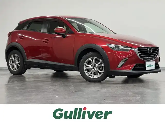 マツダ ＣＸ－３ XD ツーリング 三重県 2015(平27)年 6.3万km ソウルレッドプレミアムメタリック 1.5 ディーゼルターボ/FF/MTモード付フロア6AT/純正 7インチナビ/（AM/FM/aha/Stitcher/Bluetooth/USB/AUX/【OP】CD/DVD/TV）/バックカメラ/BOSEサウンドシステム（7スピーカー）/ビルトイン ETC/安全/・【OP】スマートブレーキサポート［SBS］/・スマートシティブレーキサポート［SCBS］/・【OP】車線逸脱警報システム［LDWS］/・【OP】マツダレーダークルーズコントロール［MRCC］/・【OP】ハイビームコントロールシステム［HBC］/・ブラインドスポットモニタリング［BSM］/装備/・ハーフレザーシート/・オートエアコン/・オートライト/・LEDヘッドライト/・オートワイパー/・アクティブドライビングディスプレイ/・プッシュスタート/・電動格納ドアミラー/・純正18inAW/・アドバンストキーx2