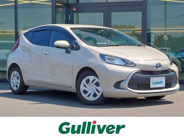 トヨタ アクア G 東京都 2021(令3)年 2.7万km クリアベージュメタリック 純正ディスプレイオーディオ/パノラミックビューモニター/フルセグ/ビルトインETC/AC100V/コーナーセンサー/スマートキー/トヨタセーフティセンス/プリクラッシュセーフティ/レーントレーシングアシスト/レーダークルーズコントロール/オートマチックハイビーム/ブラインドスポットモニター