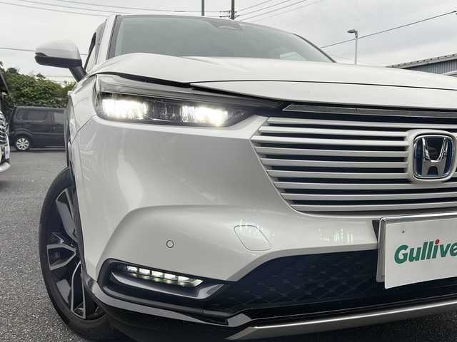 ホンダ ヴェゼル ハイブリッド e:HEV Z 埼玉県 2022(令4)年 3.3万km プラチナホワイトパール ワンオーナー/運転席エアバッグ	/助手席エアバッグ	/サイドエアバッグ	/ABS(アンチロックブレーキ)/トラクションコントロール	/前席シートベルトプリテンショナー	/前席シートベルトフォースリミッター/後席３点式シートベルト	/ブレーキアシスト	/衝突安全ボディー	採用/EBD（電子制動力配分装置）	/盗難防止システム	/その他安全装備	VSA(ABS+TCS+横すべり抑制) ヒルディセントコントロール/エアコン	フルオート/パワーウィンドウ	/集中ドアロック	/ステアリングテレスコピック機構	/ステアリングチルト機構	/クルーズコントロール	/本革巻きステアリング	/アルミホイール	18インチ標準/分割可倒式リアシート	分割式/UVカットガラス	/プライバシーガラス