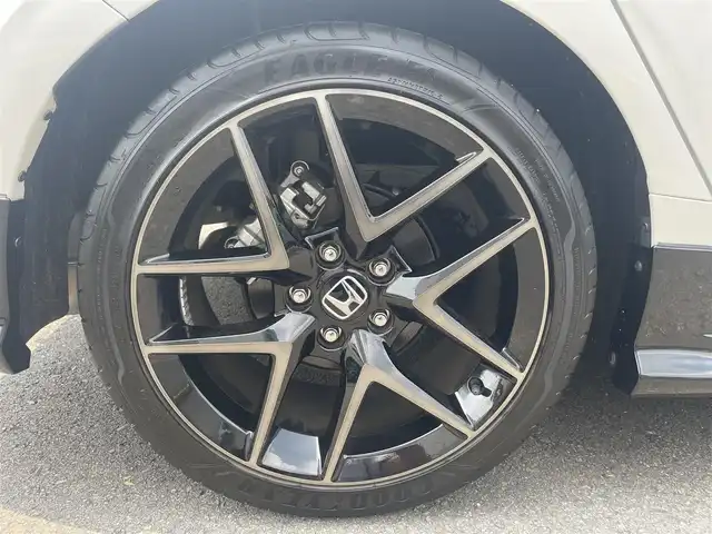 ホンダ シビック EX 静岡県 2023(令5)年 0.5万km プラチナホワイトパール HondaSENSING/HondaCONNECTディスプレー/　AM FM Bluetooth スマホ連携/バックカメラ/アダプティブクルーズコントロール/ブラインドスポットモニタリング/前後クリアランスソナー/前席シートヒーター/前席パワーシート/電動パーキングブレーキ/オートブレーキホールド/6速MT/リアウイング/ワイヤレス充電/USBジャック/スマートキー×2本/ETC2.0/BOSEプレミアムサウンド