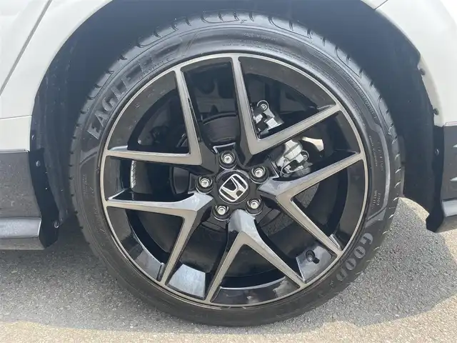 ホンダ シビック EX 静岡県 2023(令5)年 0.5万km プラチナホワイトパール HondaSENSING/HondaCONNECTディスプレー/　AM FM Bluetooth スマホ連携/バックカメラ/アダプティブクルーズコントロール/ブラインドスポットモニタリング/前後クリアランスソナー/前席シートヒーター/前席パワーシート/電動パーキングブレーキ/オートブレーキホールド/6速MT/リアウイング/ワイヤレス充電/USBジャック/スマートキー×2本/ETC2.0/BOSEプレミアムサウンド