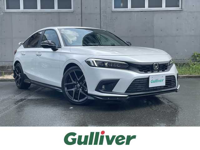ホンダ シビック EX 静岡県 2023(令5)年 0.5万km プラチナホワイトパール HondaSENSING/HondaCONNECTディスプレー/　AM FM Bluetooth スマホ連携/バックカメラ/アダプティブクルーズコントロール/ブラインドスポットモニタリング/前後クリアランスソナー/前席シートヒーター/前席パワーシート/電動パーキングブレーキ/オートブレーキホールド/6速MT/リアウイング/ワイヤレス充電/USBジャック/スマートキー×2本/ETC2.0/BOSEプレミアムサウンド