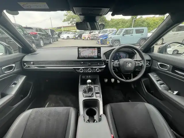 ホンダ シビック EX 静岡県 2023(令5)年 0.5万km プラチナホワイトパール HondaSENSING/HondaCONNECTディスプレー/　AM FM Bluetooth スマホ連携/バックカメラ/アダプティブクルーズコントロール/ブラインドスポットモニタリング/前後クリアランスソナー/前席シートヒーター/前席パワーシート/電動パーキングブレーキ/オートブレーキホールド/6速MT/リアウイング/ワイヤレス充電/USBジャック/スマートキー×2本/ETC2.0/BOSEプレミアムサウンド