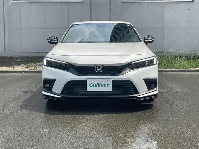 ホンダ シビック EX 静岡県 2023(令5)年 0.5万km プラチナホワイトパール HondaSENSING/HondaCONNECTディスプレー/　AM FM Bluetooth スマホ連携/バックカメラ/アダプティブクルーズコントロール/ブラインドスポットモニタリング/前後クリアランスソナー/前席シートヒーター/前席パワーシート/電動パーキングブレーキ/オートブレーキホールド/6速MT/リアウイング/ワイヤレス充電/USBジャック/スマートキー×2本/ETC2.0/BOSEプレミアムサウンド
