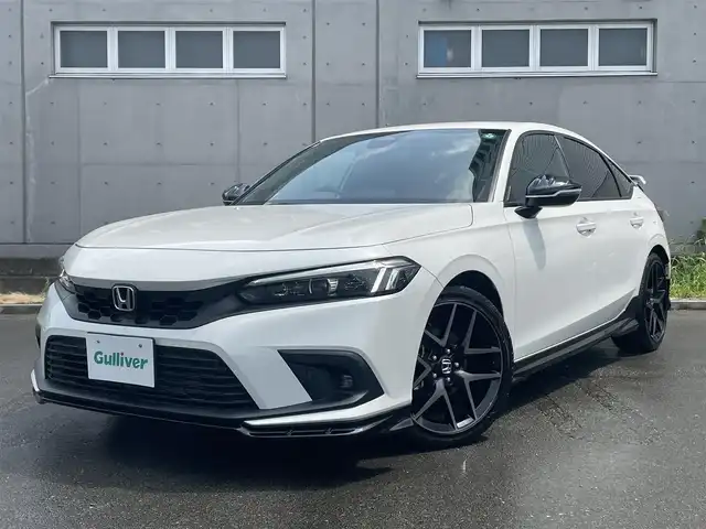 ホンダ シビック EX 静岡県 2023(令5)年 0.5万km プラチナホワイトパール HondaSENSING/HondaCONNECTディスプレー/　AM FM Bluetooth スマホ連携/バックカメラ/アダプティブクルーズコントロール/ブラインドスポットモニタリング/前後クリアランスソナー/前席シートヒーター/前席パワーシート/電動パーキングブレーキ/オートブレーキホールド/6速MT/リアウイング/ワイヤレス充電/USBジャック/スマートキー×2本/ETC2.0/BOSEプレミアムサウンド