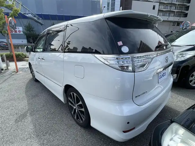 トヨタ エスティマ アエラス プレミアムエディション 兵庫県 2014(平26)年 11.4万km ホワイトパールクリスタルシャイン (株)IDOMが運営する【じしゃロン西宮店】の自社ローン対象車両になります。こちらは現金ご利用時の価格です。自社ローンご希望の方は別途その旨お申付け下さい。/＊両側パワースライドドア/＊フルセグテレビ/＊バックカメラ/＊ETC/＊ハーフレザーシート/＊リアスポイラー/＊１８インチアルミ