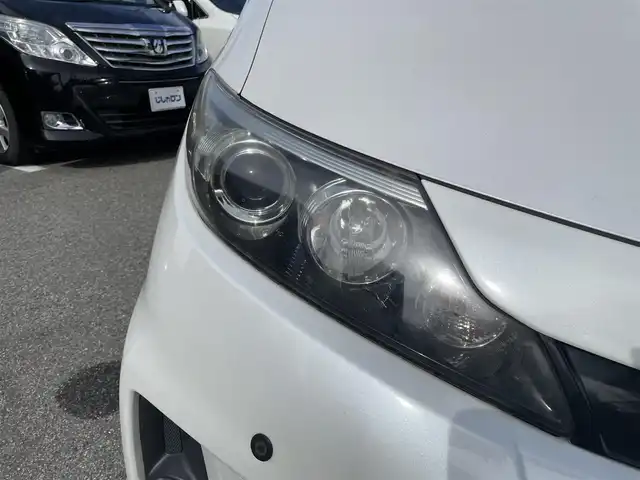 トヨタ エスティマ アエラス プレミアムエディション 兵庫県 2014(平26)年 11.4万km ホワイトパールクリスタルシャイン (株)IDOMが運営する【じしゃロン西宮店】の自社ローン対象車両になります。こちらは現金ご利用時の価格です。自社ローンご希望の方は別途その旨お申付け下さい。/＊両側パワースライドドア/＊フルセグテレビ/＊バックカメラ/＊ETC/＊ハーフレザーシート/＊リアスポイラー/＊１８インチアルミ