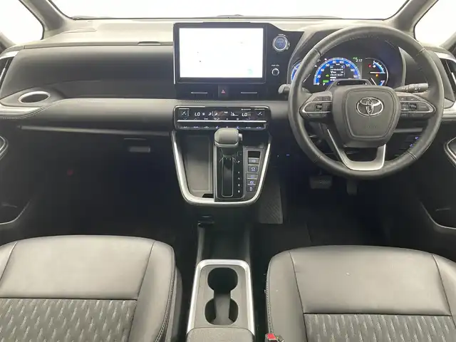 トヨタ ノア ハイブリッド S－Z 愛知県 2023(令5)年 3.5万km アティチュードブラックマイカ 純正１０．５型ナビ　ＢＳＭ　禁煙車　快適利便Ｈｉｇｈ　ＤＶＤデッキ　シートヒーター　ハンドルヒーター　電動リアゲート　両側パワスラ　ＡＣ１００Ｖ電源　前後ドラレコ　セーフティセンス　衝突軽減　ＬＥＤオートライト　フォグランプ　追従クルコン　コーナーセンサー　フォグランプ　USB　タイプC　オットマン　ハーフレザー　電動パーキング　オートホールド