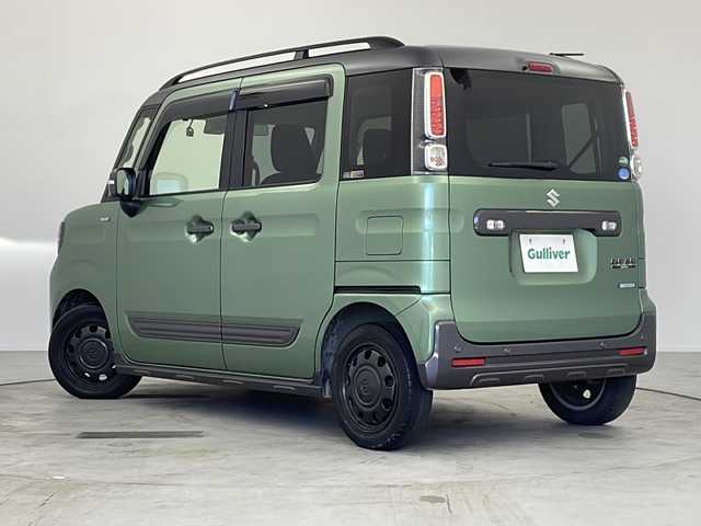 スズキ スペーシア ギア HYBRID XZターボ 愛知県 2020(令2)年 3.9万km ツールグリーンパールメタリック/ガンメタリック2トーンルーフ 純正SDナビ（AVIC-RWS901II）/AM/FM/CD/DVD/フルセグTV/BT/iPod/USB/AUX/ビルトインETC/両側パワースライドドア/電動格納ウィンカーミラー/シートヒーター（D/N席）/スズキセーフティサポート/・デュアルカメラブレーキサポート/・後退時ブレーキサポート/・誤発進抑制機能（前進・後退時）/・車線逸脱警報/・ふらつき警報/・先行車発進お知らせ機能/・ハイビームアシスト/・ロードサインアシスト/・オートクルーズコントロール/アイドリングストップ/革巻きステアリング/ステアリングスイッチ/パドルシフト/LEDオートヘッドライト/LEDフォグライト/後席用サーキュレーター/運転席シート背面折りたたみテーブル/ISOFIX