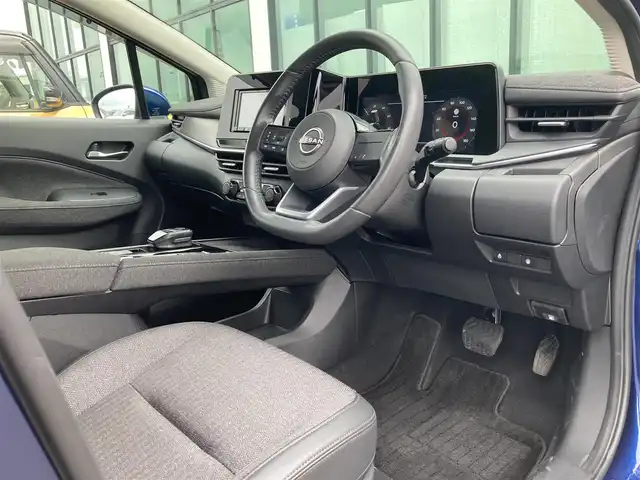 日産 オーラ G  90周年記念車 香川県 2024(令6)年 1万km 青 登録時走行距離：9959ｋｍ/純正ナビゲーション/→CD/DVD再生/→フルナビTV/全方向カメラ/ステアリングヒーター/ステアリングリモコン/革巻きステアリング/オートブレーキ/LEDオートヘッドライト/オートハイビーム/純正17インチアルミホイール/電格ウィンカーミラー/ブレーキアシスト/盗難防止装置/スマートキー