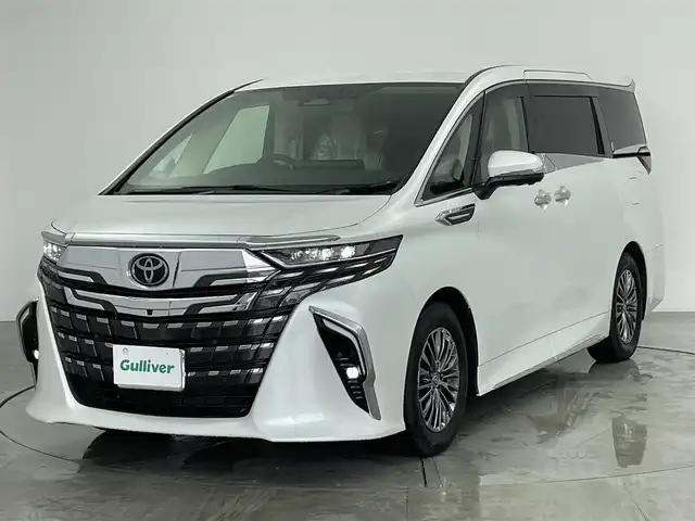 トヨタ アルファードハイブリット エグゼクティブ ラウンジ 愛知県 2023(令5)年 2.8万km プラチナホワイトパールマイカ チームトヨタ/モデリスタ　クールシャインキット/（フードガーニッシュ、サイドドアガーニッシュ、フェンダーガーニッシュ、ミラーガーニッシュ、リアクォーターガーニッシュ、バックドアガーニッシュ）/ユニバーサルステップ/ヘッドアップディスプレイ/JBLプレミアムサウンド/後部モニター/ベージュ革シート/ガラスフール/純正オーディオナビ/両側パワースライドドア/４DW/全方位カメラ/パワーシート/シートヒーター/シートクーラー/AFS/ステアリングヒーター/純正17インチAW/ブラインドスポットモニター/フルセグTV/USB端子入力/ETC2.0/オートライト/オートマチックハイビーム/純正LEDライト