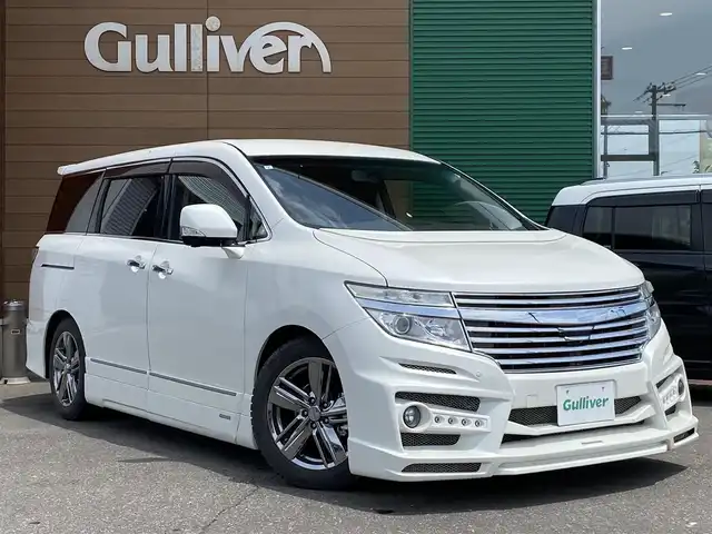 日産 エルグランド ライダー 黒本革 マニュアルシート 道央・札幌 2011(平23)年 5万km ブリリアントホワイトパール 登録時走行距離49411km/　4　W　D　/寒冷地仕様/ケンスタイルフルエアロ/社外フロントグリル/黒本革シート　マニュアルシート/純正メーカーOPナビ/(AM/FM/CD/DVD/AUX)/ワンセグTV/バックカメラ/サイドカメラ/全方位カメラ/ビルトインETC/両側パワースライドドア/純正フリップダウンモニター/横滑り防止装置/オーテックAW18インチ装着/HIDヘッドライト/ウォークスルー/2列目オットマンシート/純正フロアマット/純正ドアバイザー/社外足回り積み込みあり