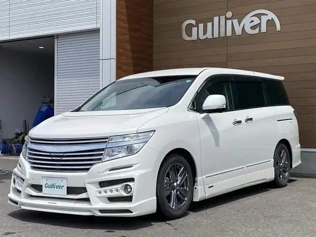 日産 エルグランド ライダー 黒本革 マニュアルシート 道央・札幌 2011(平23)年 5万km ブリリアントホワイトパール 登録時走行距離49411km/　4　W　D　/寒冷地仕様/ケンスタイルフルエアロ/社外フロントグリル/黒本革シート　マニュアルシート/純正メーカーOPナビ/(AM/FM/CD/DVD/AUX)/ワンセグTV/バックカメラ/サイドカメラ/全方位カメラ/ビルトインETC/両側パワースライドドア/純正フリップダウンモニター/横滑り防止装置/オーテックAW18インチ装着/HIDヘッドライト/ウォークスルー/2列目オットマンシート/純正フロアマット/純正ドアバイザー/社外足回り積み込みあり