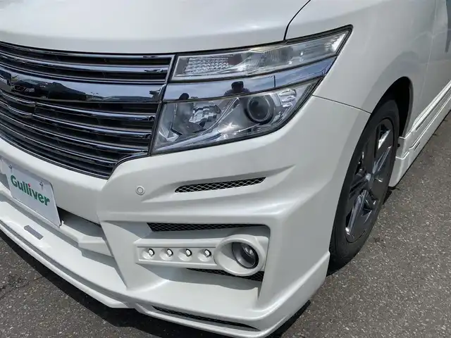 日産 エルグランド ライダー 黒本革 マニュアルシート 道央・札幌 2011(平23)年 5万km ブリリアントホワイトパール 登録時走行距離49411km/　4　W　D　/寒冷地仕様/ケンスタイルフルエアロ/社外フロントグリル/黒本革シート　マニュアルシート/純正メーカーOPナビ/(AM/FM/CD/DVD/AUX)/ワンセグTV/バックカメラ/サイドカメラ/全方位カメラ/ビルトインETC/両側パワースライドドア/純正フリップダウンモニター/横滑り防止装置/オーテックAW18インチ装着/HIDヘッドライト/ウォークスルー/2列目オットマンシート/純正フロアマット/純正ドアバイザー/社外足回り積み込みあり
