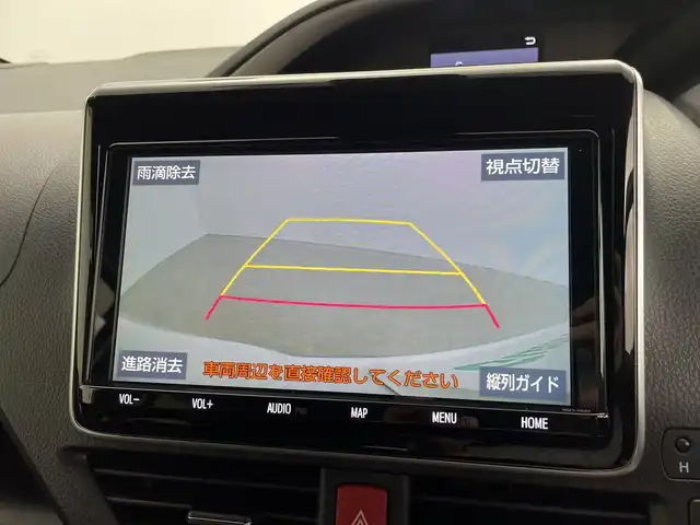 トヨタ ヴォクシー ZS 煌Ⅲ 鹿児島県 2021(令3)年 2.7万km ホワイトパールクリスタルシャイン 登録時走行距離 27085km/純正９型ナビ　/フルセグＴＶ　/12.1インチフリップダウンモニター　(V12T-R68C)/バックカメラ　/前後ドライブレコーダー/純正１６インチアルミホイール　/両側パワースライドドア/ビルトインＥＴＣ　/クルーズコントロール　/ＬＥＤヘッドライト　/フォグランプ/オートマチックハイビーム　/オートライト/ハーフレザーシート/純正フロアマット/前後コーナーセンサー/衝突軽減システム/盗難防止装置/横滑り防止装置/レーンキープアシスト/アイドリングストップ