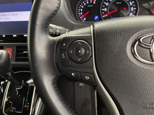 トヨタ ヴォクシー ZS 煌Ⅲ 鹿児島県 2021(令3)年 2.7万km ホワイトパールクリスタルシャイン 登録時走行距離 27085km/純正９型ナビ　/フルセグＴＶ　/12.1インチフリップダウンモニター　(V12T-R68C)/バックカメラ　/前後ドライブレコーダー/純正１６インチアルミホイール　/両側パワースライドドア/ビルトインＥＴＣ　/クルーズコントロール　/ＬＥＤヘッドライト　/フォグランプ/オートマチックハイビーム　/オートライト/ハーフレザーシート/純正フロアマット/前後コーナーセンサー/衝突軽減システム/盗難防止装置/横滑り防止装置/レーンキープアシスト/アイドリングストップ