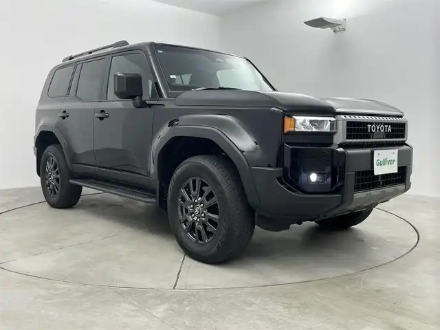 トヨタ ランドクルーザー ２５０ VX 愛知県 2024(令6)年 0.6万km ブラック ４WD/トヨタチームメイト/トヨタセーフティーセンス/・衝突軽減/・ロードサイン　/・クリアランスソナー/・ブラインドスポットモニター/・レーンディパラーチャー/・後方接近警告装置/サンルーフ/純正ディスプレイオーディオナビ/・フルセグ/・Bluetooth/・Applecarplay/パワーバックドア/パワーシート/全方位カメラ/エアシート/シートヒーター/3列シート/7人乗り/ステアリングヒーター/革巻きステアリング/ステアリングリモコン/デジタルインナーミラー/ETC2.0/トノカバー/リアAAC/HDMI/typeC/USB/LEDヘッドライト