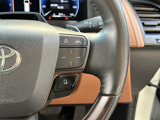 トヨタ ヴェルファイア ハイブリット Z プレミア 広島県 2024(令6)年 1.7万km プラチナホワイトパールマイカ 左右独立ムーンルーフ/トヨタチームメイト/・アドバンストパーク/・パーキングサポートブレーキ（周辺静止物）/・アドバンストドライブ/・緊急時操舵支援/・フロントクロストラフィックアラート/・レーンチェンジアシスト/・ドライバーモニターカメラ/セーフティセンス/・プリクラッシュセーフティ/・レーントレーシングアシスト/・全車速追従機能付レーダークルーズコントロール/・アダプティブハイビームシステム/・ロードサインアシスト/・ドライバー異常時対応システム/・プロアクティブドライビングアシスト/・発進遅れ告知機能/BSM/パーキングサポートブレーキ/デジタルインナーミラー/ドラレコ/純正14インチディスプレイオーディオナビ/・地デジTV/・ETC2.0/パノラミックビューモニター/HUD/両側パワースライドドア/パワーバックドア/サンセットブラウンプレミアムナッパ革シート/シートヒーター/ベンチレーション/パワーシート/メモリーシート/ステアリングヒーター/ステアリングスイッチ/おくだけ充電/フロアマット/ドアバイザー/スマートキー/スペアキー