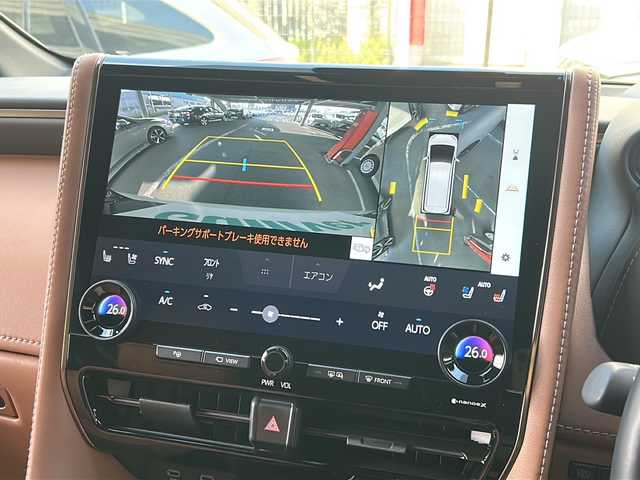 トヨタ ヴェルファイア ハイブリット Z プレミア 広島県 2024(令6)年 1.7万km プラチナホワイトパールマイカ 左右独立ムーンルーフ/トヨタチームメイト/・アドバンストパーク/・パーキングサポートブレーキ（周辺静止物）/・アドバンストドライブ/・緊急時操舵支援/・フロントクロストラフィックアラート/・レーンチェンジアシスト/・ドライバーモニターカメラ/セーフティセンス/・プリクラッシュセーフティ/・レーントレーシングアシスト/・全車速追従機能付レーダークルーズコントロール/・アダプティブハイビームシステム/・ロードサインアシスト/・ドライバー異常時対応システム/・プロアクティブドライビングアシスト/・発進遅れ告知機能/BSM/パーキングサポートブレーキ/デジタルインナーミラー/ドラレコ/純正14インチディスプレイオーディオナビ/・地デジTV/・ETC2.0/パノラミックビューモニター/HUD/両側パワースライドドア/パワーバックドア/サンセットブラウンプレミアムナッパ革シート/シートヒーター/ベンチレーション/パワーシート/メモリーシート/ステアリングヒーター/ステアリングスイッチ/おくだけ充電/フロアマット/ドアバイザー/スマートキー/スペアキー