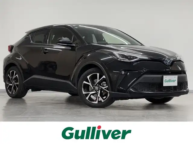 トヨタ Ｃ－ＨＲ G 三重県 2021(令3)年 5.8万km ブラックマイカ ハイブリッド/FF/フロアCVT/純正 8型ディスプレイオーディオ＋ナビ/　（AM/FM/USB/Bluetooth/TV/CarPlay/AndroidAuto）/パノラミックビューモニター/ドライブレコーダー 前後/ビルトイン ETC/Toyota Safety Sense/・プリクラッシュセーフティ［PCS］/・レーンディパーチャーアラート［LDA］（操舵支援あり）/・ブラインドスポットモニター［BSM］/・リヤクロストラフィックアラート［RCTA］/・【OP】インテリジェントクリアランスソナー［パーキングサポートブレーキ（静止物）］/・レーダークルーズ/・オートハイビーム［AHB］/装備/・ハーフレザーシート/・【OP】シートヒーター（D/N）/・【OP】電動ランバーサポート（D）/・オートライトシステム/・LEDヘッドライト/・LEDフロントフォグライト/・純正18inAW/・プッシュスタート/・スマートキーシステム/・保/取/ナビ取/マルチ取