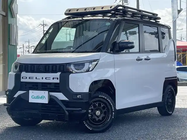 三菱 デリカミニ T プレミアム 埼玉県 2024(令6)年 0.7万km アメジストブラック/シルキーホワイト ・4WD/・ルーフレール/・ルーフラック/・バンパーガード/・RAYS15インチAW/・純正9インチディスプレイオーディオ/・Bluetooth/AM/FM/・全方位カメラ/バックカメラ/〇三菱e-Assist/・衝突被害軽減ブレーキシステム/・踏み間違い衝突防止アシスト/・車線逸脱警報システム/・車線逸脱防止支援機能/・オートマチックハイビーム/・マイパイロット/・レーダークルーズコントロール/・車線維持支援機能/・両側パワースライドドア/・ハンズフリーオートスライドドア/・アイドリングストップ/・革巻きステアリング/・パドルシフト/・ステアリングスイッチ/・ステアリングヒーター/・ハーフレザーシート/・シートヒーター(D/N)/・プッシュスタート/・スマートキー/・スペアキー/・ダウンヒルアシスト/・LEDヘッドライト/・オートライト/・フォグライト